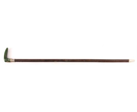 A SILVER METAL MOUNTED JADE HANDLED GENTLEMAN'S WALKING STICK - Possibly Russian with crested leaf work mount and collar, wit