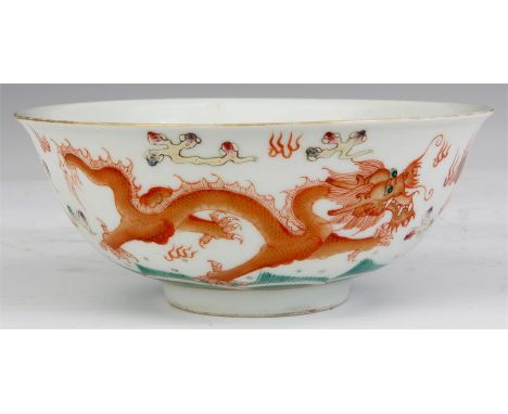 A 19TH CENTURY CHINESE FLARED SHALLOW BOWL with colourful enamelled decoration to the exterior of dragons chasing the flaming