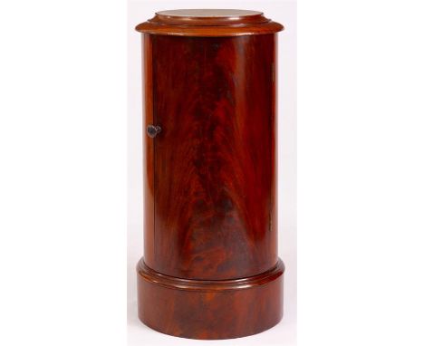 A MID 19th CENTURY FLAMED MAHOGANY CYLINDRICAL BEDSIDE CABINET with white marble top and cupboard beneath 79cm high, 37cm dia