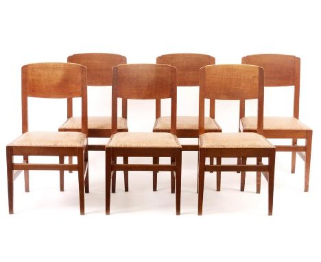 ROBERT THOMPSON KILBURN  A SET OF SIX MOUSEMAN OAK DINING CHAIRS with solid back tapering uprights and front legs joined by u