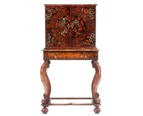 A WILLIAM AND MARY LABURNUM OYSTER VENEERED FLORAL MARQUETRY AND STAINED GREEN IVORY COLLECTORS CABINET ON STAND being of sma