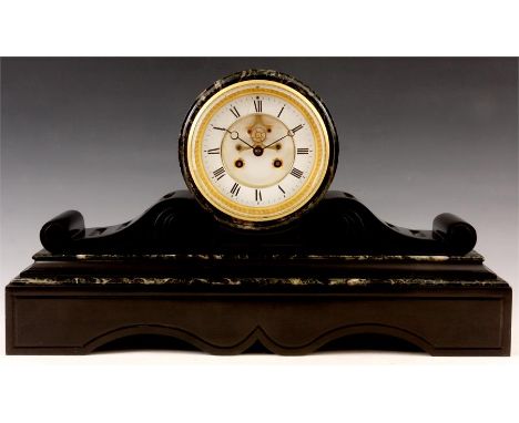 A LATE 19th CENTURY BLACK SLATE DRUM SHAPED MANTEL CLOCK  having scrolling plinth base and green veined marble mouldings encl