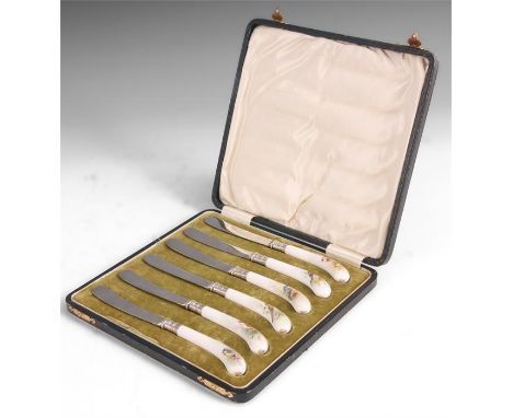 A CASED SET OF SIX ROYAL WORCESTER CAKE KNIVES with pistol shaped porcelain handles finely painted with different specimens o