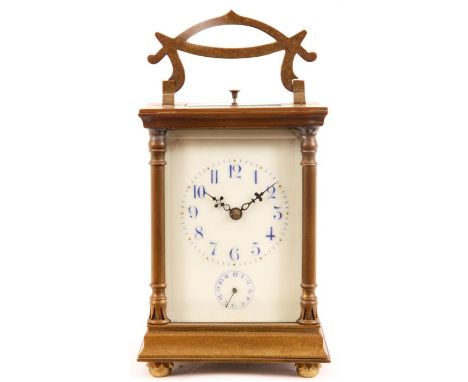 A LATE 19TH CENTURY FRENCH BRASS QUARTER STRIKING CARRIAGE CLOCK REPEATER WITH ALARM the art nouveau style case with turned c