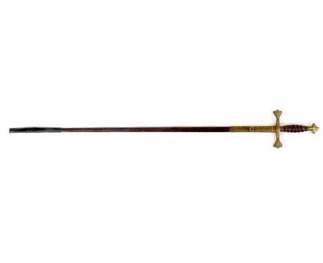 AN EARLY 20th CENTURY MASONIC CEREMONIAL SWORD having finely engraved polished steel blade with leather handle, gilt brass hi