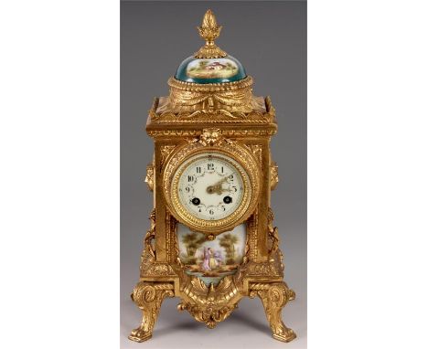 A LATE 19th CENTURY ORNATE GILT METAL FRENCH MANTEL CLOCK with domed porcelain pediment and painted romantic classical garden