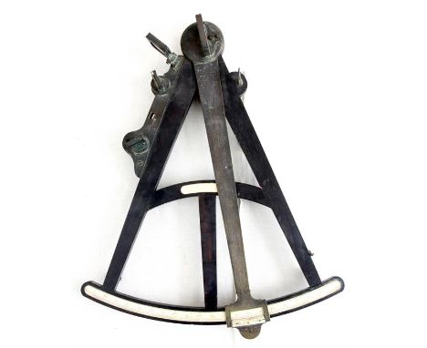 A LARGE GEORGE III EBONY FRAMED OCTANT with ivory scales and brass index arm with floral engraving, drum, pike and flags leng