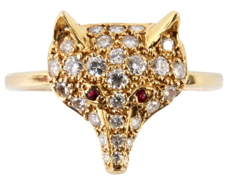 AN UNUSUAL PERIOD DIAMOND ENCRUSTED FOX HEAD RING WITH RUBY SET EYES