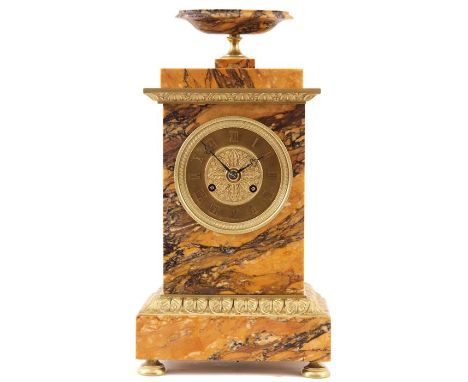 AN EARLY 19th CENTURY FRENCH SIENNA MARBLE AND ORMOLU MOUNTED MANTEL CLOCK with rectangular case surmounted by urn finial and