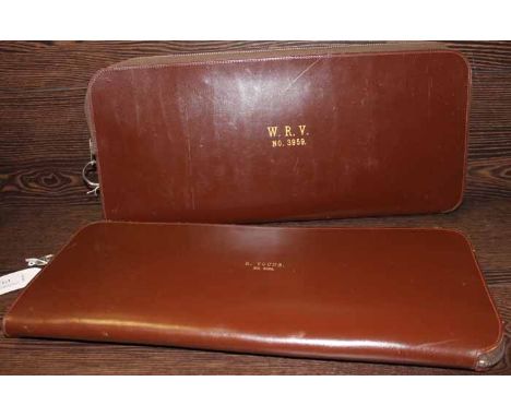 TWO MASONIC APRONS
inside original leather carry bags, the first gilt embossed with 'R. Young No. 3959', the second 'W.R.V No