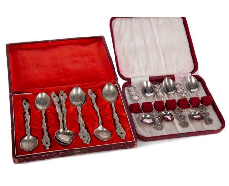 SET OF ELEVEN CHINESE WHITE METAL TEASPOONS,the stems modelled as dragons, the bowl reverses stamped 'Shanghai 900', 13cm lon