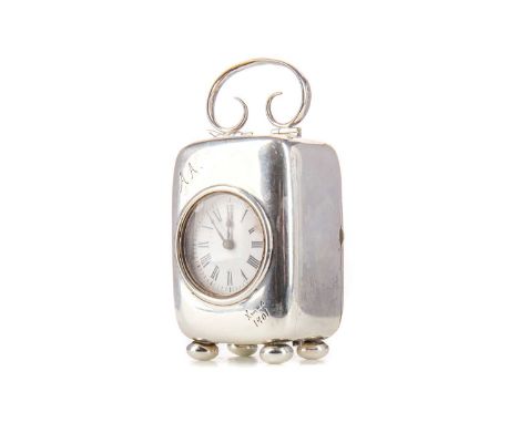 EDWARDIAN SILVER MOUNTED SMALL SIZED MANTLE CLOCK,maker Henry Williamson Ltd, Birmingham 1902, the case with swing handle, en