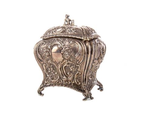 VICTORIAN SILVER TEA CADDY IN THE ROCOCO TASTE,maker Charles Stuart Harris, London 1896, profusely decorated in repousse, the