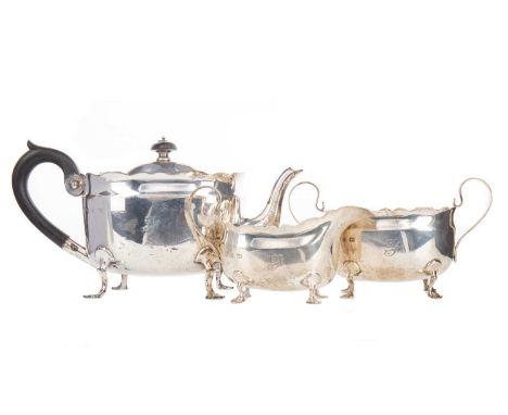 VICTORIAN SILVER THREE-PIECE TEA SERVICE,maker Hukin &amp; Heath, Birmingham 1898, each of oval form with scalloped rim, scro