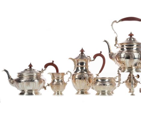 FINE AND IMPRESSIVE GEORGE VI SILVER FIVE-PIECE TEA AND COFFEE SERVICE,maker The Goldsmiths &amp; Silversmiths Company Ltd., 