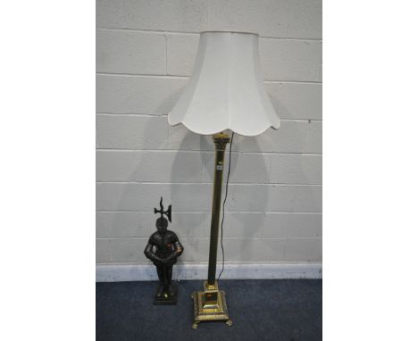 A VICTORIAN STYLE BRASS CORINTHIAN COLUMN STANDARD LAMP, with a single shade, along with a fireplace knight (knight incomplet