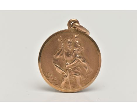 A 9CT GOLD ST.CHRISTOPHER PENDANT, of an oval form, approximate diameter 24.2mm, hallmarked 9ct Sheffield import, fitted with