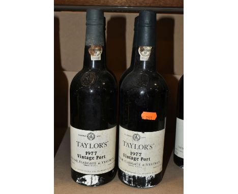 FOUR BOTTLES OF TAYLOR'S 1977 VINTAGE PORT, bottled in Oporto by Taylor, Fladgate &amp; Yeatman, 21% vol. 75cl, all seals app
