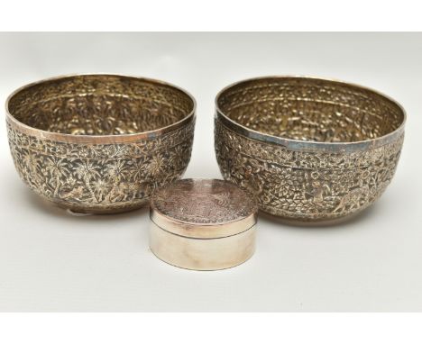 TWO LATE 19TH CENTURY INDIAN WHITE METAL BOWLS AND A MODERN SILVER PLATE ON COPPER TRINKET BOX, the two bowls repoussé decora