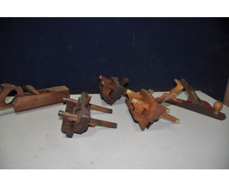 A COLLECTION OF FIVE VINTAGE VICES comprising three beach and brass fillister planes, an Acorn No5 and a vintage block plane 
