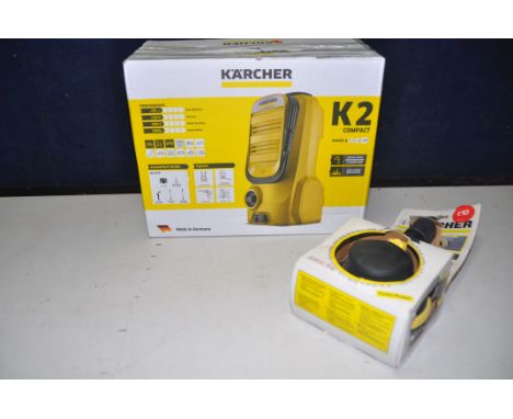 A KARCHER K2 COMPACT in new unused/unopened condition (UNTESTED), along with a Karcher rotary was brush in packaging unused/n