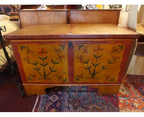 An Indonesian hand painted pine mule chest with fitted candle box and raised on carved bracket feet, H:80cm W:124cm D:70cm