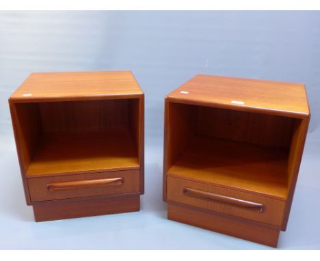 A pair of G-Plan teak lamp tables single drawer and raised o block base, H:53cm W:46cm D:41cm