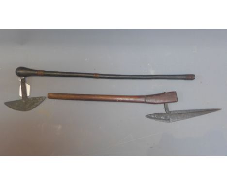 A Zimbabwean Shona axe L.72cm together with another tribal axe. L.68cm 