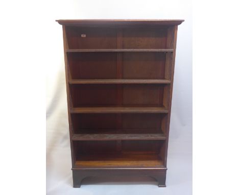 A mahogany five shelf classic book case 