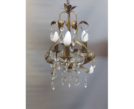 A glass pendant 3 light gilt hanging lamp