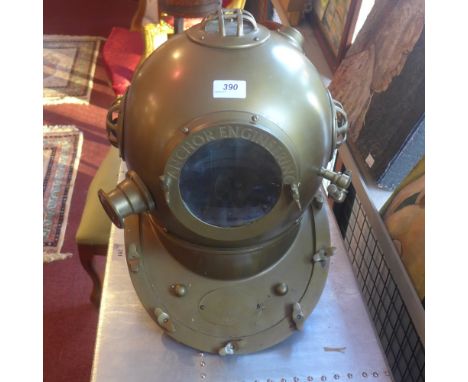 A contemporary brass model of a divers helmet.