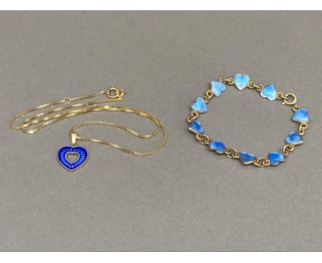 Silver gilt and blue enamel jewellery comprising a pendant on chain and child’s bracelet, both with heart shaped decoration 8