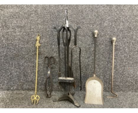 A fire side companion set and other fire related items including a brass toasting fork