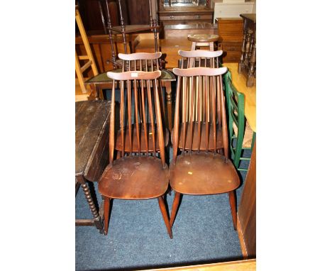 A SET OF FOUR ERCOL DINING CHAIRS