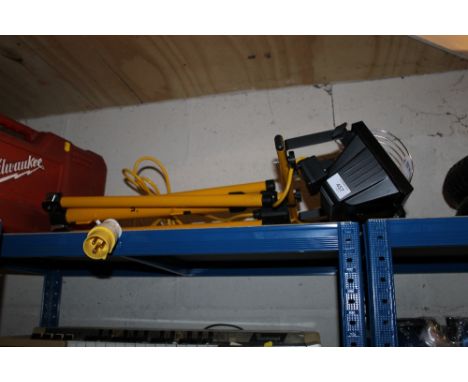 *A TWIN HALOGEN TRIPOD LIGHT