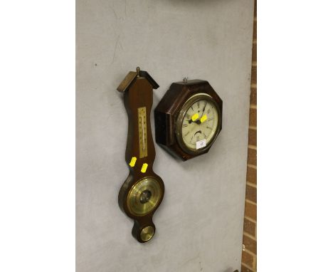 A SMALL OAK FRAMED CLOCK & A BAROMETER