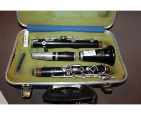 A CASED BOOSEY & HAWKES CLARINET