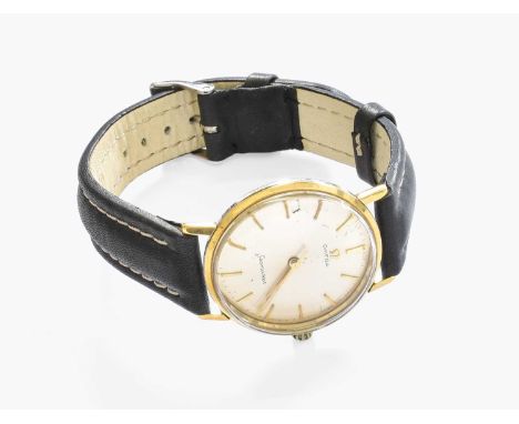 A Gold Plated Manual Wound Centre Seconds Omega Seamaster WristwatchCase with surface scratches, outer edge of the besel with