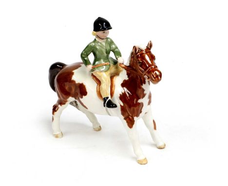 Beswick Girl on Pony, model No. 1499, skewbald gloss