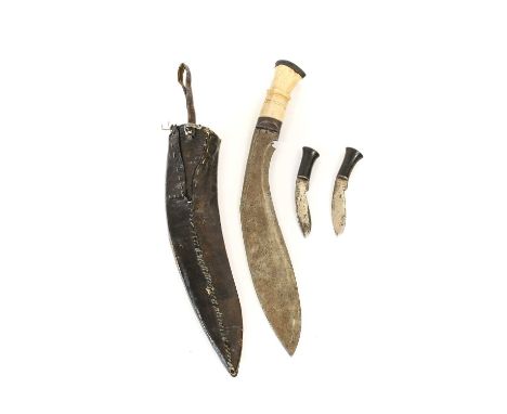 A Nepalese Kukri, the 28.5cm curved steel blade with two narrow fullers to the back edge, with steel bolster, the ring knoppe