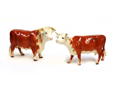 Beswick Hereford Cattle Comprising: Bull, model No. 949 and Cow, model No. 948, tan and white gloss (2) (a.f)Bull in overall 