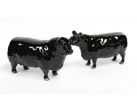 Beswick Aberdeen Angus Cattle comprising: Bull, model No. 1562, and Cow, model No. 1563, both in black gloss (2)Both models i