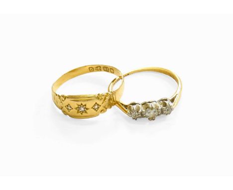 An 18 Carat Gold Diamond Three Stone Ring, finger size N1/2; and Another Diamond Three Stone Ring, stamped ‘18CT’ and ‘PLAT’,