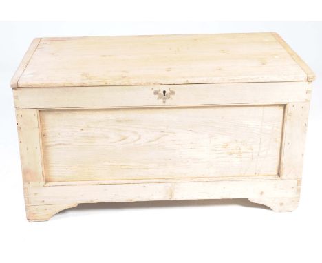 A 19th Century pine blanket chestThe rectangular plank top with cleated ends enclosing a fitted candle box, with inverted pan