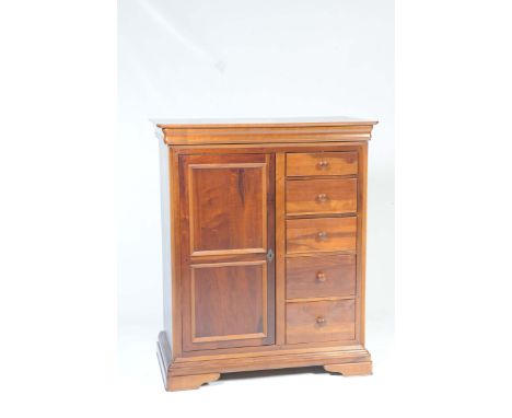 A reproduction mahogany Georgian style gents wardrobe by Willis & GambierThe rectangular top with rounded front corners above