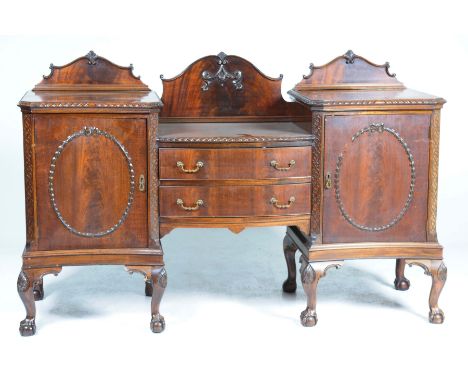 A mahogany Chippendale revival sideboard, early 20th CenturyOf turreted form with a gadroon border over two central drawers f