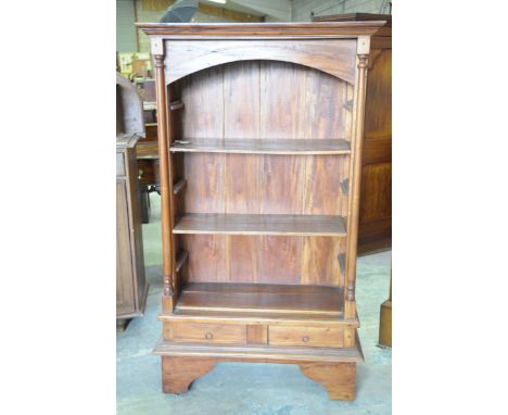 A contemporary hardwood open bookcaseWith a moulded cornice above an arched recess enclosing two shelves, flanked by two turn