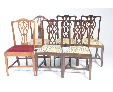 A set of four Chippendale style mahogany dining chairs, early 20th CenturyEach with an interlaced openwork splat back above d
