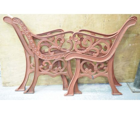 Two pairs of painted cast railway bench endsEach cast with a scroll design, height 78cm.