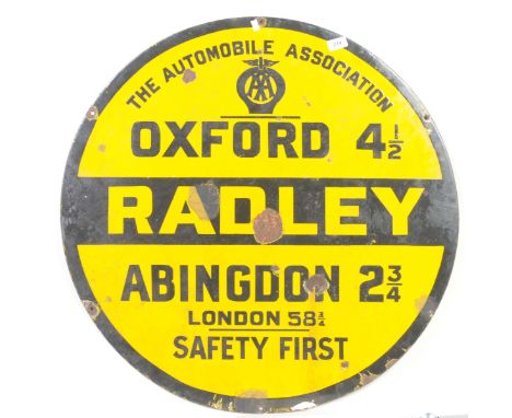 An early 20th Century circular enamelled AA signPainted in black and yellow "The Automobile Association Oxford 4½, Abingdon 2